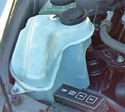 How to replace winshied washer pump on 2002 ford taurus #2